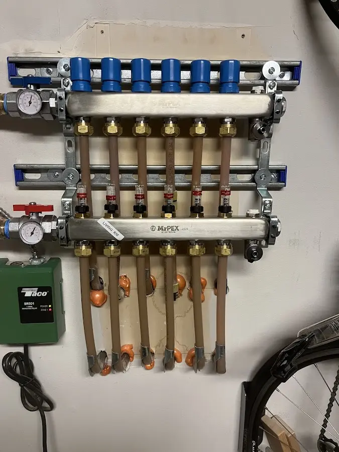 Plumber performing Water Heater Repair at a residential property in Springfield